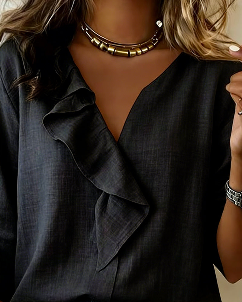 Egyszínű hosszú ujjú blúz fodros díszítéssel